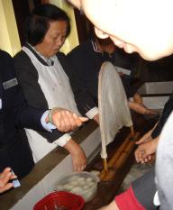 At a Silk Museum - getting the silk from the cocoon